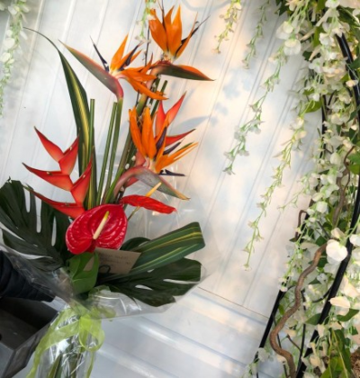 Tropical Hand-tied Bouquet - Stunning tropical stems, in a hand-tied bouquet.

Each bouquet is designed and created by the talented florists at Flowers of Kidderminster. Professional, qualified, local florists, Emma and her team add a touch of pizazz and style to every bouquet. Every arrangement is put together by hand, from scratch, from the wide selection of beautiful fresh flowers here in our shop on Lisle Avenue.

Almost what you're after? We can tailor any bouquet to your needs and budget. Want to incorporate their favourite colours? Do you want to adapt the style to your needs and budget? All colours, styles and budgets can all be catered for.

All flowers are subject to availability. Substitutes may be used but your bouquet will always look beautiful!

This item is available for delivery by Flowers of Kidderminster in Kidderminster and surrounding areas .