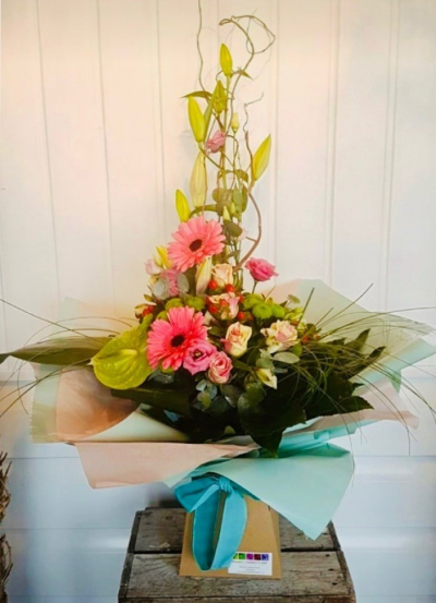 Lizzy - Surprise her with this stunning bouquet for Mother's Day.

Muted tones of pink and green blooms and foliage will bring a smile to Mum's face.

Contains Roses, Gerberas, Spray Chrysanthemums and Lillies with strong green foliage and twisted willow.

Each bouquet is designed and created by professional, qualified, local florists, Emma and her team. The talented florists at Flowers of Kidderminster add a touch of pizazz and style to every bouquet, which is put together by hand, from scratch.

Almost what you're after? We can tailor any bouquet to your needs and budget. Want to incorporate their favourite colours? Do you want to adapt the style to your needs and budget? All colours, styles and budgets can all be catered for.

All flowers are subject to availability. Substitutes may be used but your bouquet will always look beautiful!

Order in the shop, online or by telephone. Delivery is available by Flowers of Kidderminster in Kidderminster and surrounding areas.