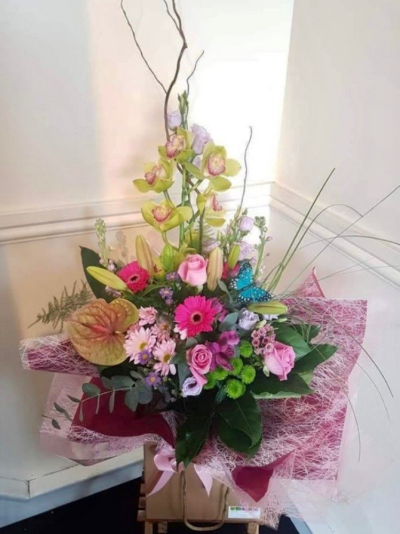 Orchid Delight - Orchids take centre stage in this special Mother's Day arrangement which also contains Gerberas, Roses, Lilies and Chrysanthemums. 

Each bouquet is designed and created by professional, qualified, local florists, Emma and her team. The talented florists at Flowers of Kidderminster add a touch of pizazz and style to every bouquet, which is put together by hand, from scratch.

Almost what you're after? We can tailor any bouquet to your needs and budget. Want to incorporate their favourite colours? Do you want to adapt the style to your needs and budget? All colours, styles and budgets can all be catered for.

All flowers are subject to availability. Substitutes may be used but your bouquet will always look beautiful!