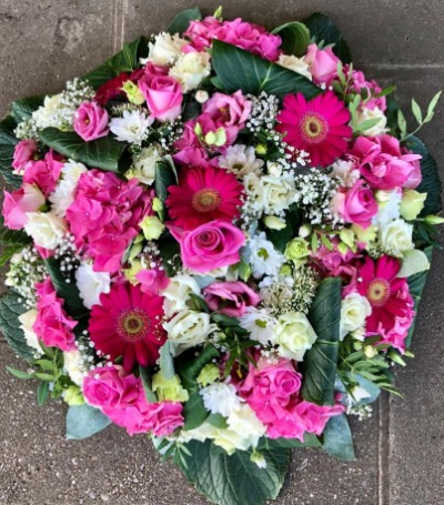 Funeral flat posy pink and white - Sympathy flowers are a beautiful way to let someone know that you are thinking of them at a sad time.

This flat posy of florist selected pink and white blooms includes gerberas, hydrangea and roses set within delicate foliage. 

Each tribute is designed and created by professional, qualified, local florists, Emma and her team. At this difficult time, they are here to help make choosing and ordering funeral flowers and sympathy tributes a little easier.

Almost what you're after? We can tailor your tribute to suit your needs and budget. Want to incorporate their favourite colours? All colours, styles and budgets can all be catered for.

All flowers are subject to availability. Substitutes may be used but your tribute will always look beautiful!

Order by 2pm for same day delivery. Also available to order for a day of your choice.