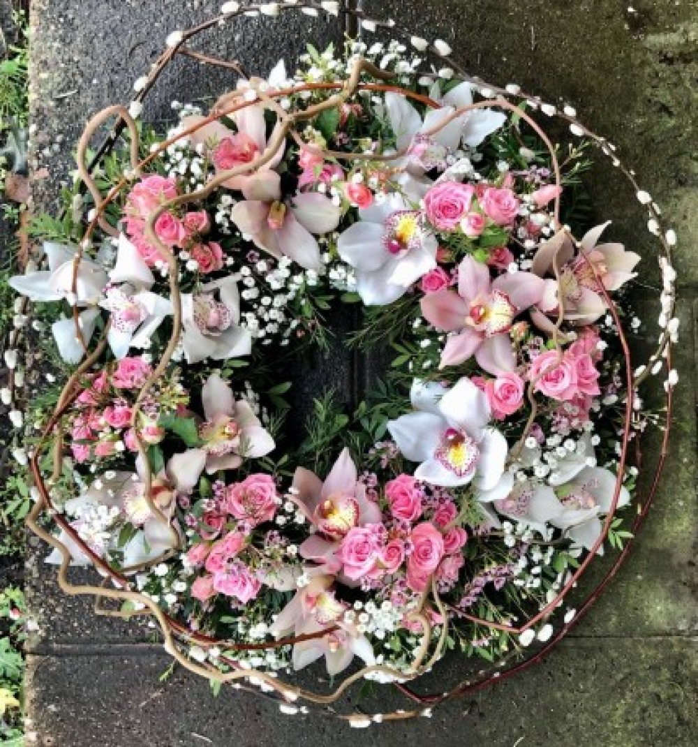 Loose orchid and rose wreath