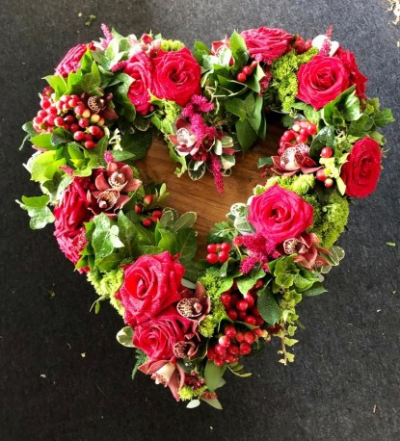Clustered Open Heart Tribute - This 17" Clustered Open Heart Tribute can be made to any colour scheme of your choice.

Funeral Tributes are created with care and attention by our team of qualified, professional and local florists Emma and her team. Please call us to discuss your requirements.

Almost what you're after? We tailor all funeral tributes to your specific requirements. We can incorporate their favourite colours or create a style that reflects their personality. Call us to talk about what you would like and we will create it for you.

You may also like to look at our Heart of Roses and Mixed Bloom Heart Sprays.

All flowers are subject to availability. Substitutes may be used but your tribute will always look beautiful!

Funeral Tributes can be delivered on the day to a location of your choice.