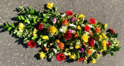 Vibrant Masculine Double Ended Coffin Spray - This vibrant and colourful, 3ft double-ended coffin spray is made up in the florists' selection of stems including Roses, Gerberas and Carnations against green foliage.

Funeral Tributes which reflect the personality and the life of the person sadly departed are created with care and attention by our team of qualified, professional and local florists.

Express condolences and pay tribute with this spray, expertly prepared by professional, locally based, florists Emma and Laura. At this difficult time, Emma and her team are here to help make choosing and ordering funeral flowers and sympathy tributes a little easier.

All arrangements are created from our collection of fresh flowers at our shop in Lisle Avenue, Kidderminster. 

Almost what you're after? We tailor all funeral tributes to your specific requirements. We can incorporate their favourite colours or create a style that reflects their personality. Come in and talk to us about what you would like and we will create it for you.

All flowers are subject to availability. Substitutes may be used but your tribute will always look beautiful!

Funeral Tributes can be delivered on the day to a location of your choice.