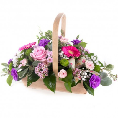 Bon Bon - Shower them with love with this cutesy collection of seasonal flowers in pretty pastels. Beautifully arranged and stylishly presented in a traditional basket.