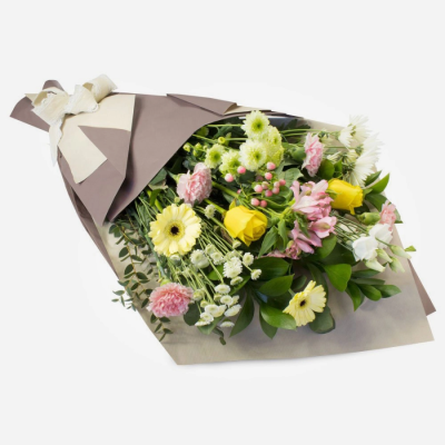 Eden - Eco-conscious and calming: pastel flowers wrapped in kraft paper, no cellophane used.