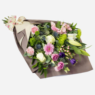 Natures choice - This special collection of elegant blooms is beautifully wrapped in paper and tied with natural ribbon.