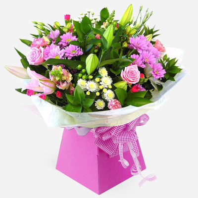 Ashleigh - Fresh blooms with lush foliage, beautifully arranged in a stylish gift box or bag.