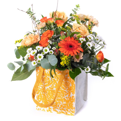 Hello Sunshine - Bright, cheerful, and full of warmth — Hello Sunshine is a radiant mix of warm colours, beautifully offset by fresh greenery. Presented in a charming jute bag, it’s a vibrant design that brings instant joy and positivity.